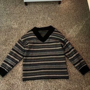 brown and black patterned v-neck sweater